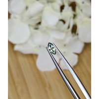 0.48 Ct. Yellowish Green Sapphire from Madagascar Life Style