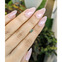 0.48 Ct. Green Sapphire from Madagascar Life Style