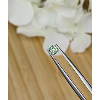 0.47 Ct. Yellowish Green Sapphire from Madagascar Life Style