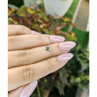 0.47 Ct. Yellowish Green Sapphire from Madagascar Life Style