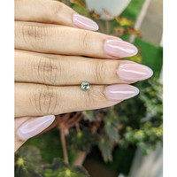 0.47 Ct. Yellowish Green Sapphire from Madagascar Life Style