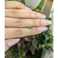 0.56 Ct. Green Sapphire from Madagascar Life Style