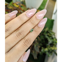 0.56 Ct. Green Sapphire from Madagascar Life Style