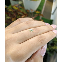 0.47 Ct. Yellowish Green Sapphire from Madagascar Life Style