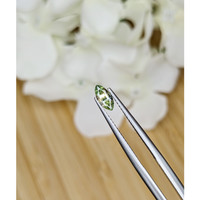 0.48 Ct. Yellowish Green Sapphire from Madagascar Life Style