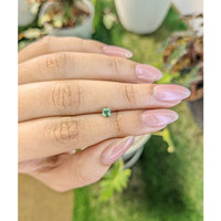 0.42 Ct. Yellowish Green Sapphire from Madagascar Life Style