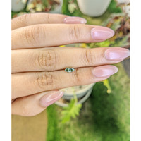 0.52 Ct. Green Sapphire from Madagascar Life Style