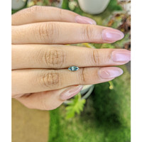 0.55 Ct. Greenish Blue Sapphire from Madagascar Life Style