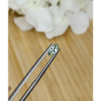 0.41 Ct. Bluish Green Sapphire from Madagascar Life Style