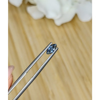 0.59 Ct. Greenish Blue Sapphire from Madagascar Life Style