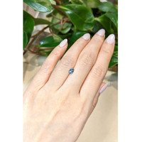 0.59 Ct. Greenish Blue Sapphire from Ceylon (Sri Lanka) Life Style