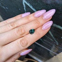 3.64 Ct. Green Sapphire from Madagascar Life Style