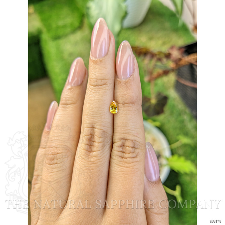 0.46 Ct. Orangish Yellow Sapphire from Ceylon (Sri Lanka)