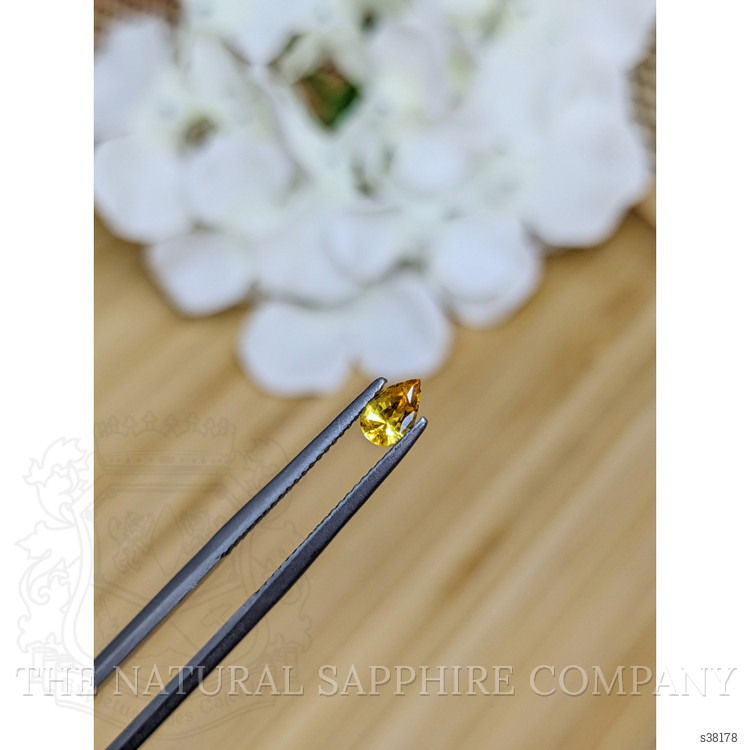 0.46 Ct. Orangish Yellow Sapphire from Ceylon (Sri Lanka)