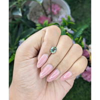 1.39 Ct. Bluish Green Sapphire from Tanzania Life Style