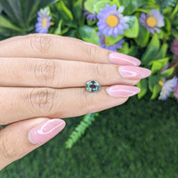 1.39 Ct. Bluish Green Sapphire from Tanzania Life Style