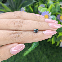 0.93 Ct. Bluish Green Sapphire from Tanzania Life Style