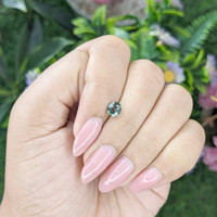 0.83 Ct. Bluish Green Sapphire from Tanzania Life Style