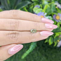 0.82 Ct. Yellowish Green Sapphire from Tanzania Life Style