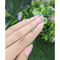 0.82 Ct. Yellowish Green Sapphire from Tanzania Life Style