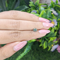 0.74 Ct. Bluish Green Sapphire from Tanzania Life Style