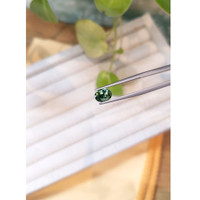1.41 Ct. Bluish Green Sapphire from Madagascar Life Style