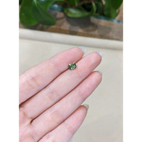 1.04 Ct. Yellowish Green Sapphire from Madagascar Life Style