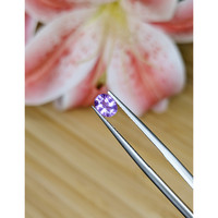 0.69 Ct. Pinkish Purple Sapphire from Madagascar Life Style