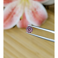 0.83 Ct. Pinkish Purple Sapphire from Madagascar Life Style