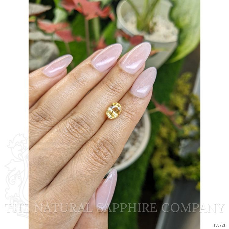 2.47 Ct. Orangish Yellow Sapphire from Ceylon (Sri Lanka)