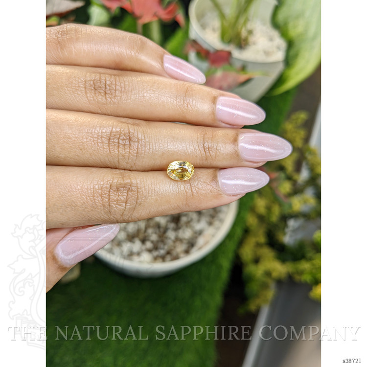 2.47 Ct. Orangish Yellow Sapphire from Ceylon (Sri Lanka)