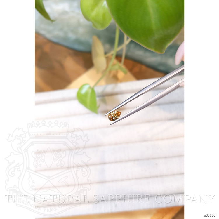 0.62 Ct. Orangish Yellow Sapphire from Montana