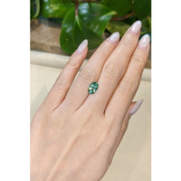 2.15 Ct. Yellowish Green Sapphire from Madagascar Life Style
