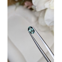 1.05 Ct. Bluish Green Sapphire from Madagascar Life Style