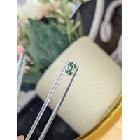 0.78 Ct. Green Sapphire from Madagascar Life Style