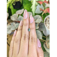 0.78 Ct. Green Sapphire from Madagascar Life Style