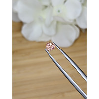 0.62 Ct. Peach Sapphire from Madagascar Life Style
