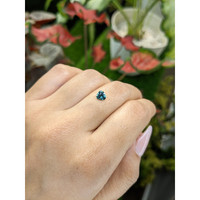 0.58 Ct. Greenish Blue Sapphire from Madagascar Life Style