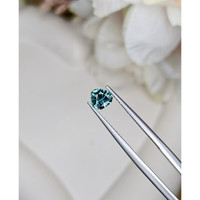 0.58 Ct. Greenish Blue Sapphire from Madagascar Life Style