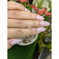 0.54 Ct. Peach Sapphire from Ceylon (Sri Lanka) Life Style