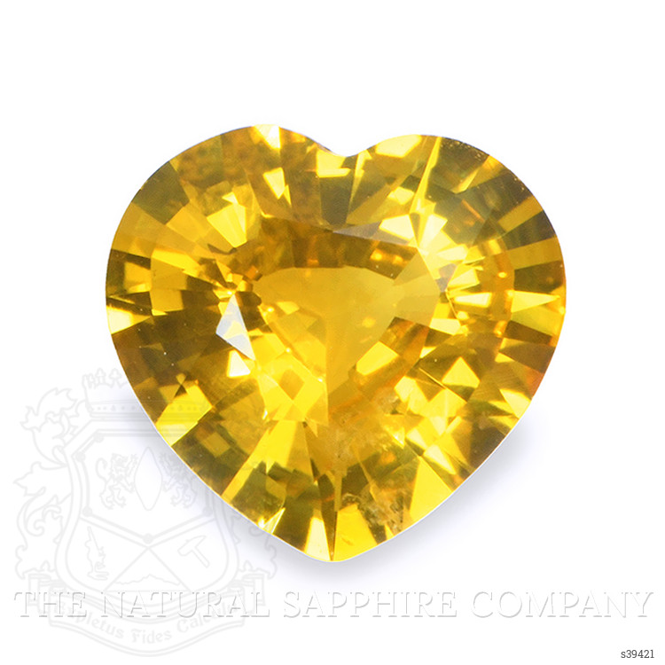 0.74 Ct. Orangish Yellow Sapphire from Ceylon (Sri Lanka)