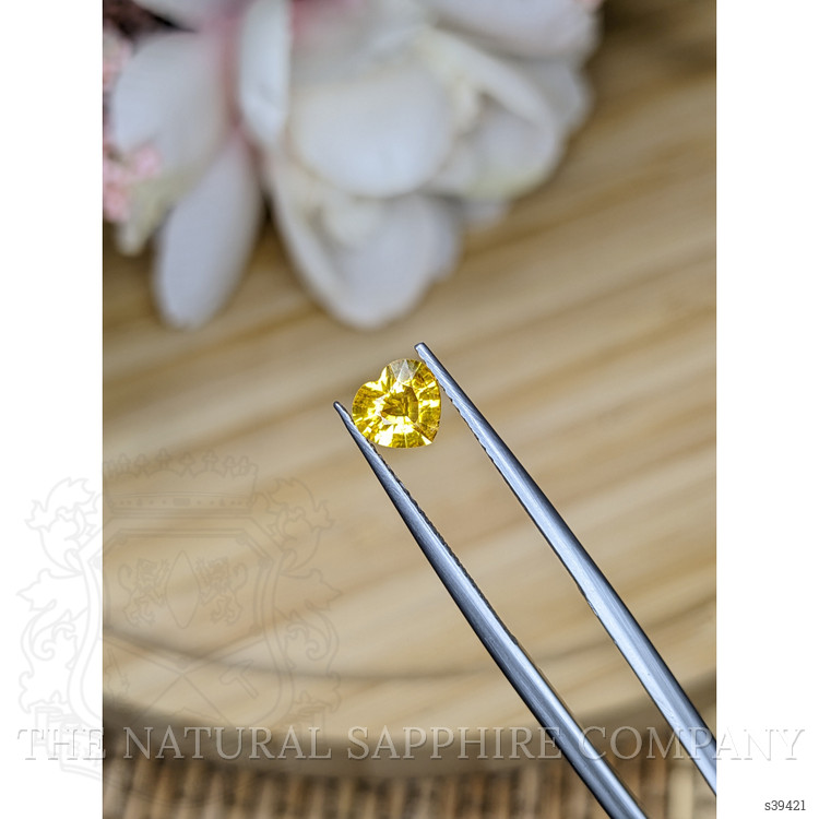0.74 Ct. Orangish Yellow Sapphire from Ceylon (Sri Lanka)