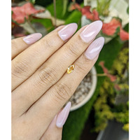 0.44 Ct. Orangish Yellow Sapphire from Ceylon (Sri Lanka) Life Style