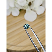 0.91 Ct. Bluish Green Sapphire from Madagascar Life Style