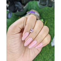 0.92 Ct. Purplish Pink Sapphire from Madagascar Life Style