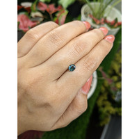 0.81 Ct. Greenish Blue Sapphire from Madagascar Life Style