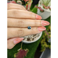 0.88 Ct. Greenish Blue Sapphire from Madagascar Life Style