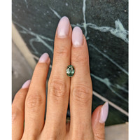 2.15 Ct. Yellowish Green Sapphire from Madagascar Life Style
