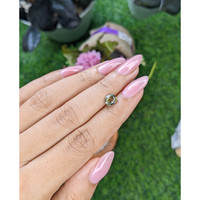 1.31 Ct. Yellowish Green Sapphire from Tanzania Life Style