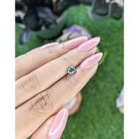 0.85 Ct. Bluish Green Sapphire from Tanzania Life Style